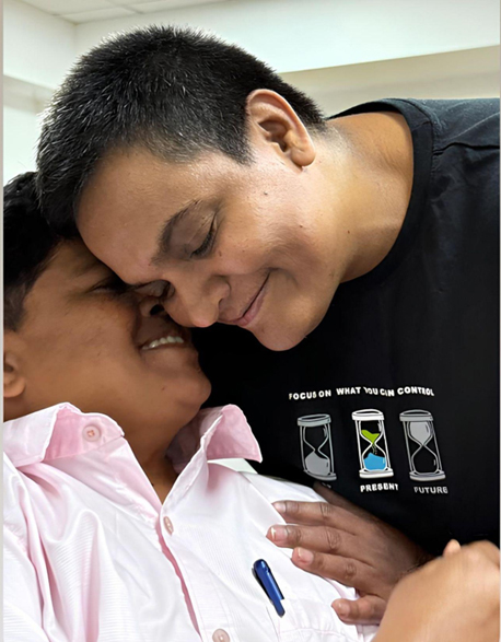 Fred Rogers with a friend smiling, representing community, inclusion, and support